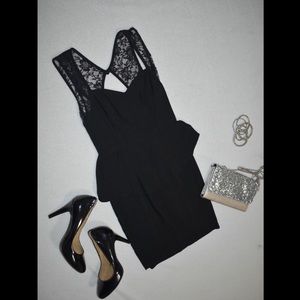 Black peplum cocktail dress